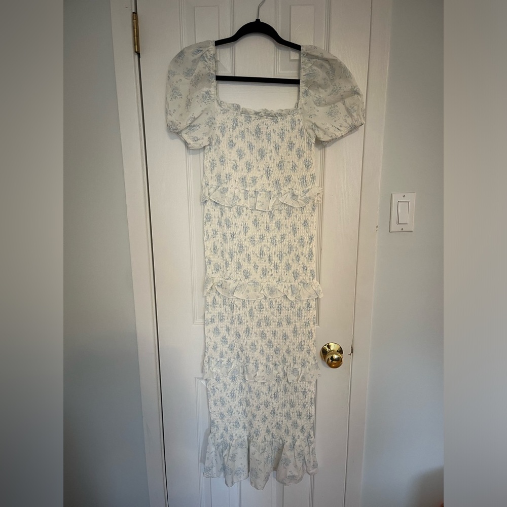 White with blue floral ruffle dress